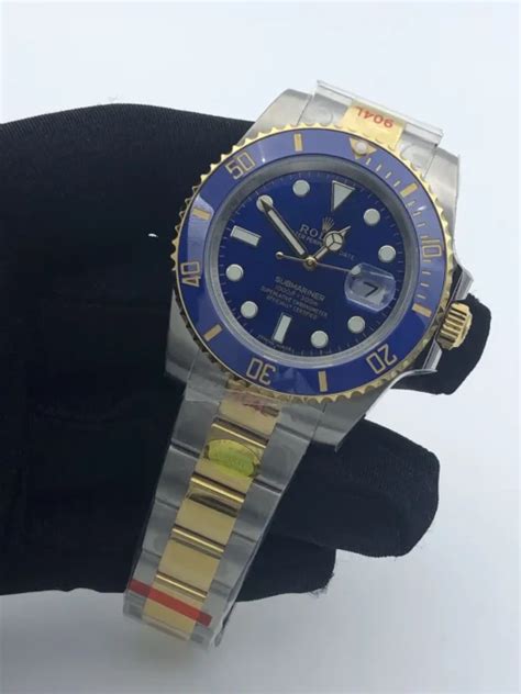 rolex submariner biru dan emas